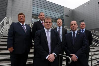 GAME ON: The directors of NVT Solutions outside the Sir Chris Hoy Velodrome in Glasgow after the contract was awarded. Picture: James Galloway