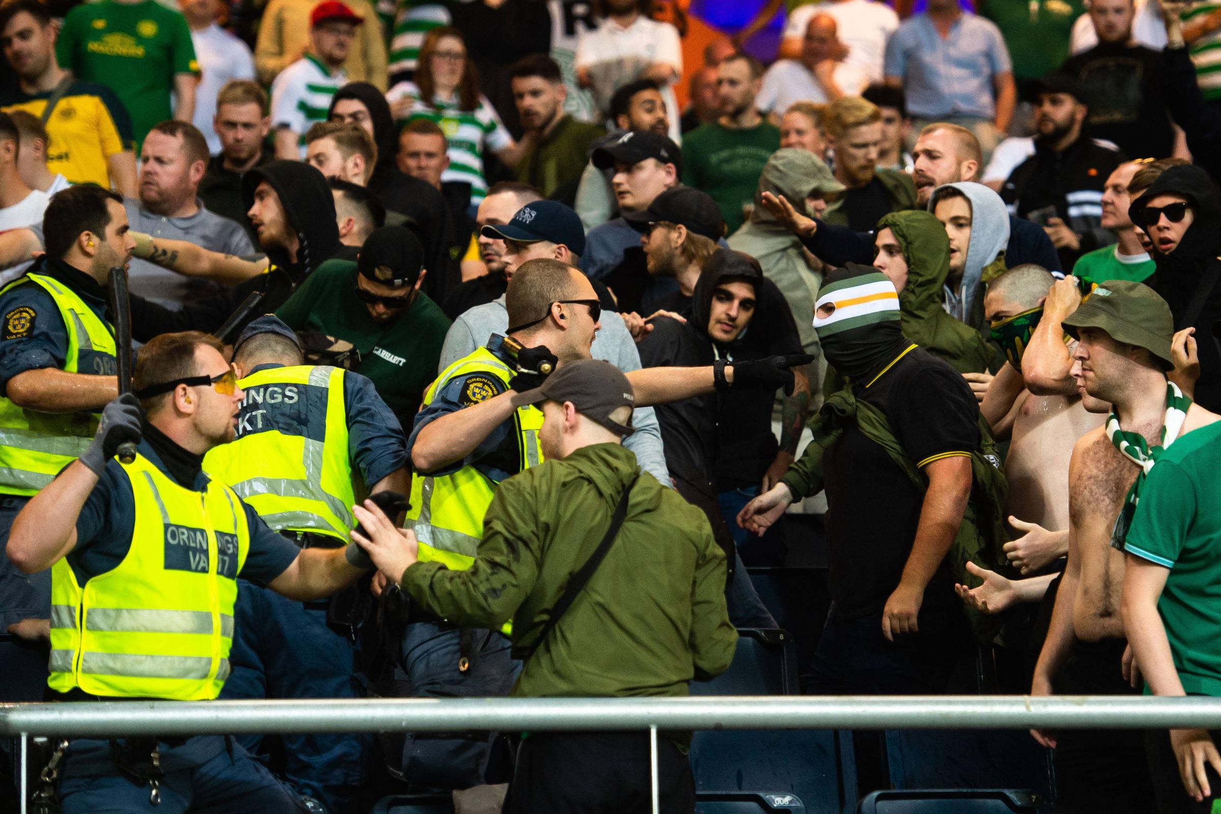 Celtic claim Swedish fans infiltrated away support to spark violent scenes with cops during AIK clash