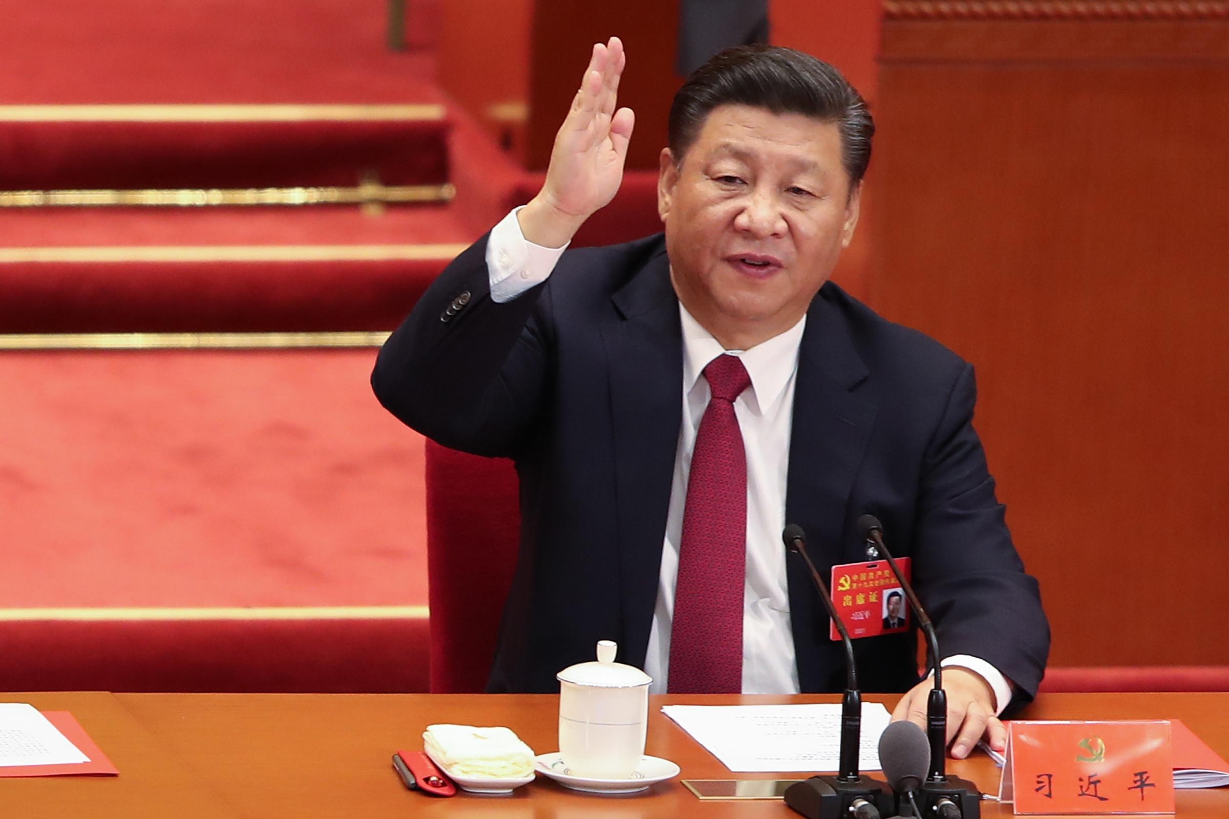 BEIJING, CHINA - OCTOBER 24: Chinese President Xi Jinping vote at the closing of the 19th Communist Party Congress at the Great Hall of the People on October 24, 2017 in Beijing, China. The 19th CPC National Congress is going to run 7 days and a new