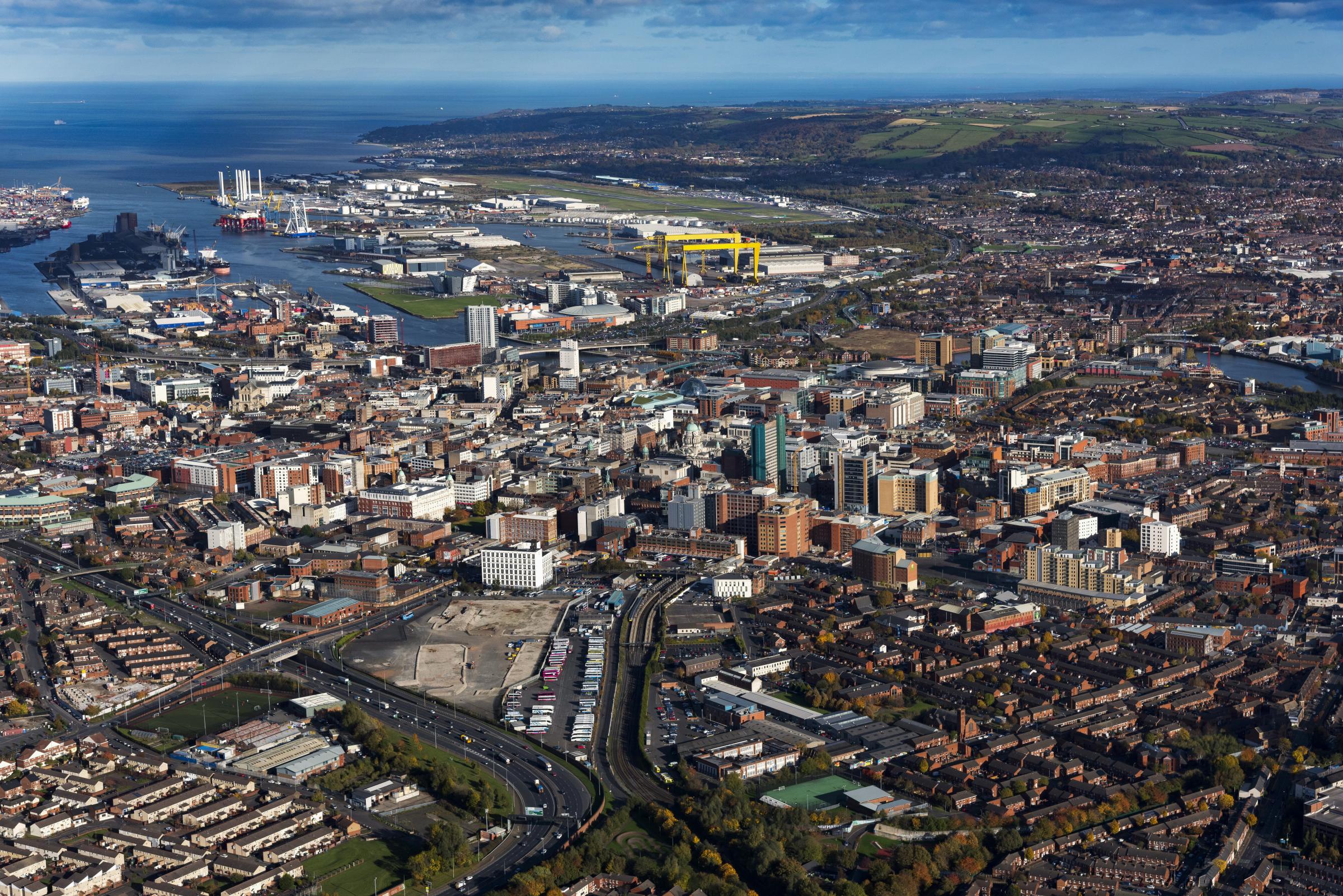 Aerial of Belfast City Center looking towards Belfast Lough and the Titanic Quarter Docklands..
