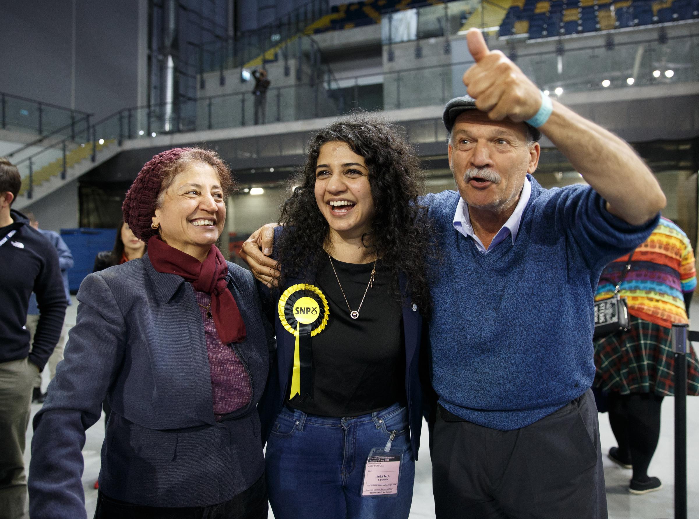 Roza Salih with her parents Tania and Saleem. Photograph by Colin Mearns.