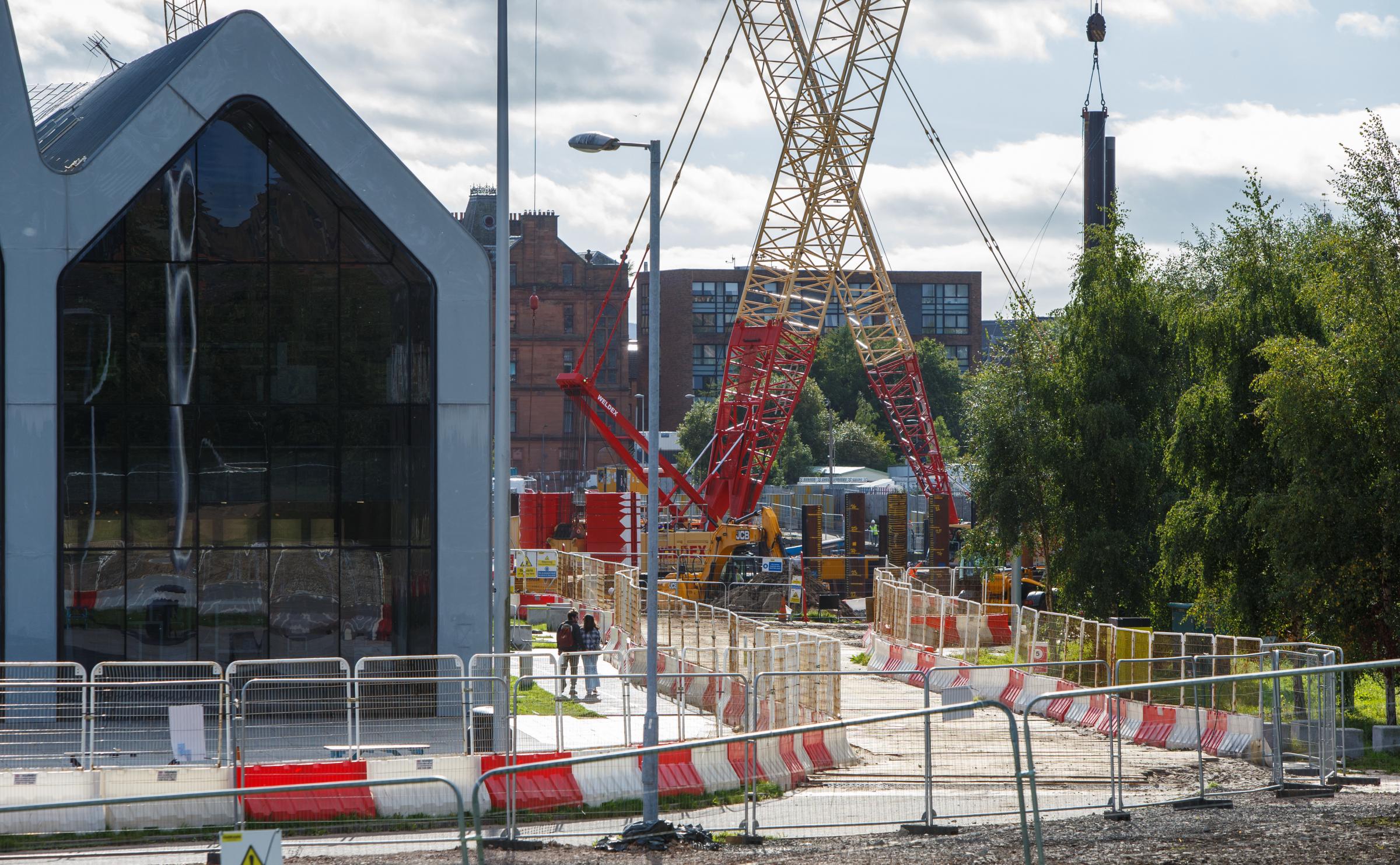 Construction of the Govan-Partick pedestrian bridge in Glasgow. The single-span swing bridge will connect Water Row in Govan and Pointhouse Quay (pictured) at the Riverside museum. Photograph by Colin Mearns.