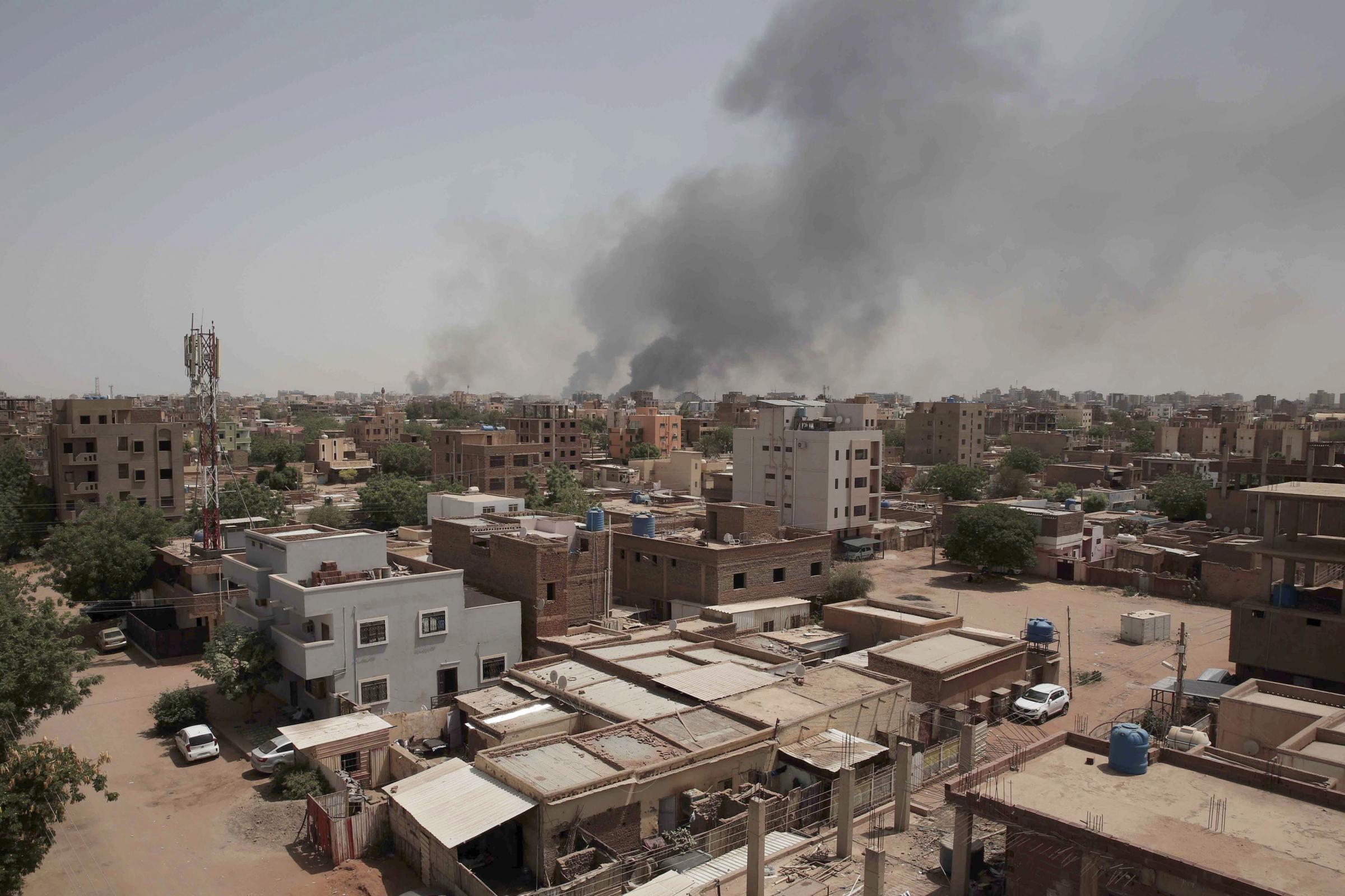 Smoke is seen rising from Khartoums skyline, Sudan, Sunday, April 16, 2023. The Sudanese military and a powerful paramilitary group battled for control of the chaos-stricken nation for a second day Sunday, signaling they were unwilling to end