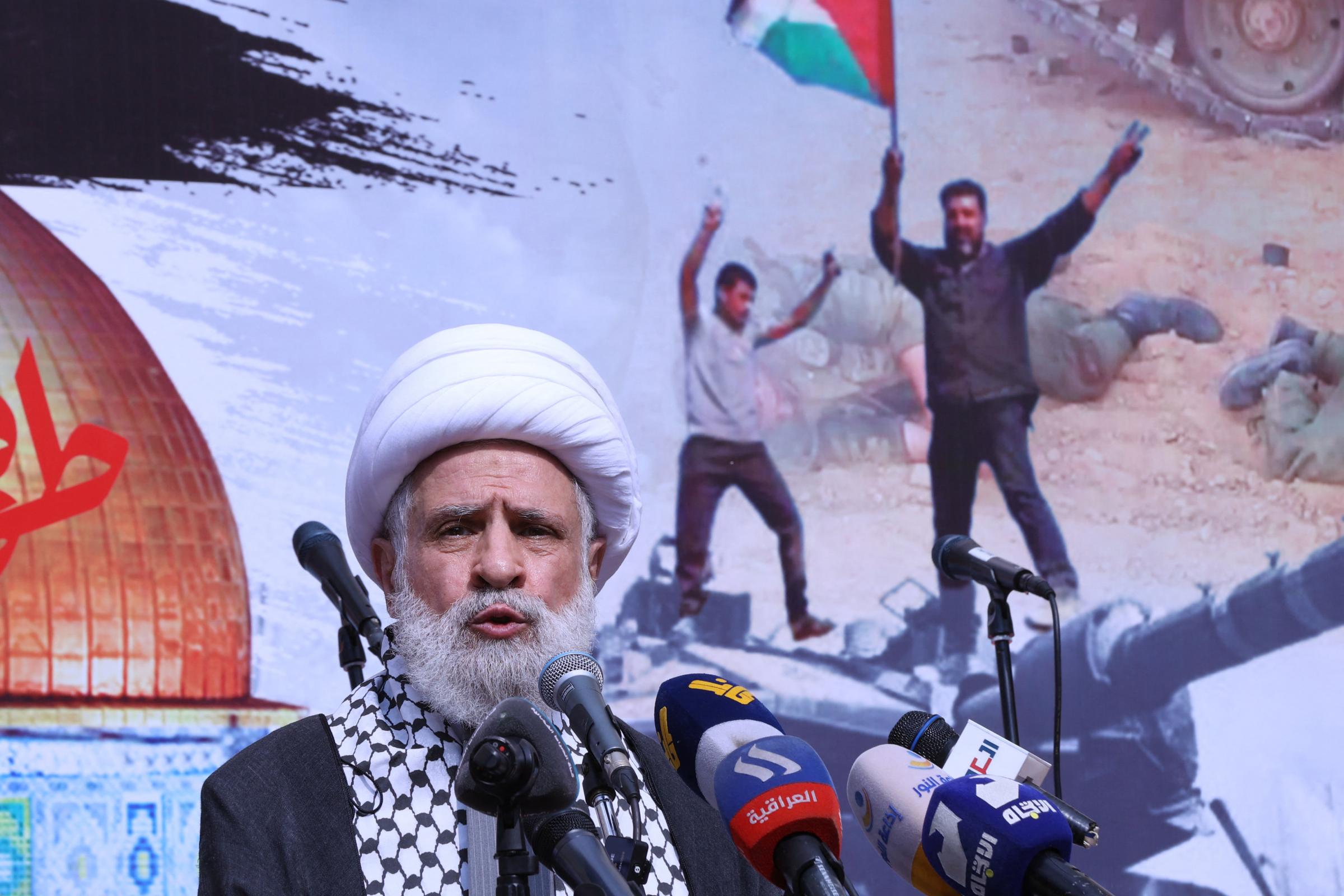 The deputy chief of Lebanons Shiite militant group Hezbollah, Sheikh Naim Qassem, delivers a speech during a rally in Beirut on October 13, 2023, as thousands of protesters poured onto the streets of several Middle East capitals in support of