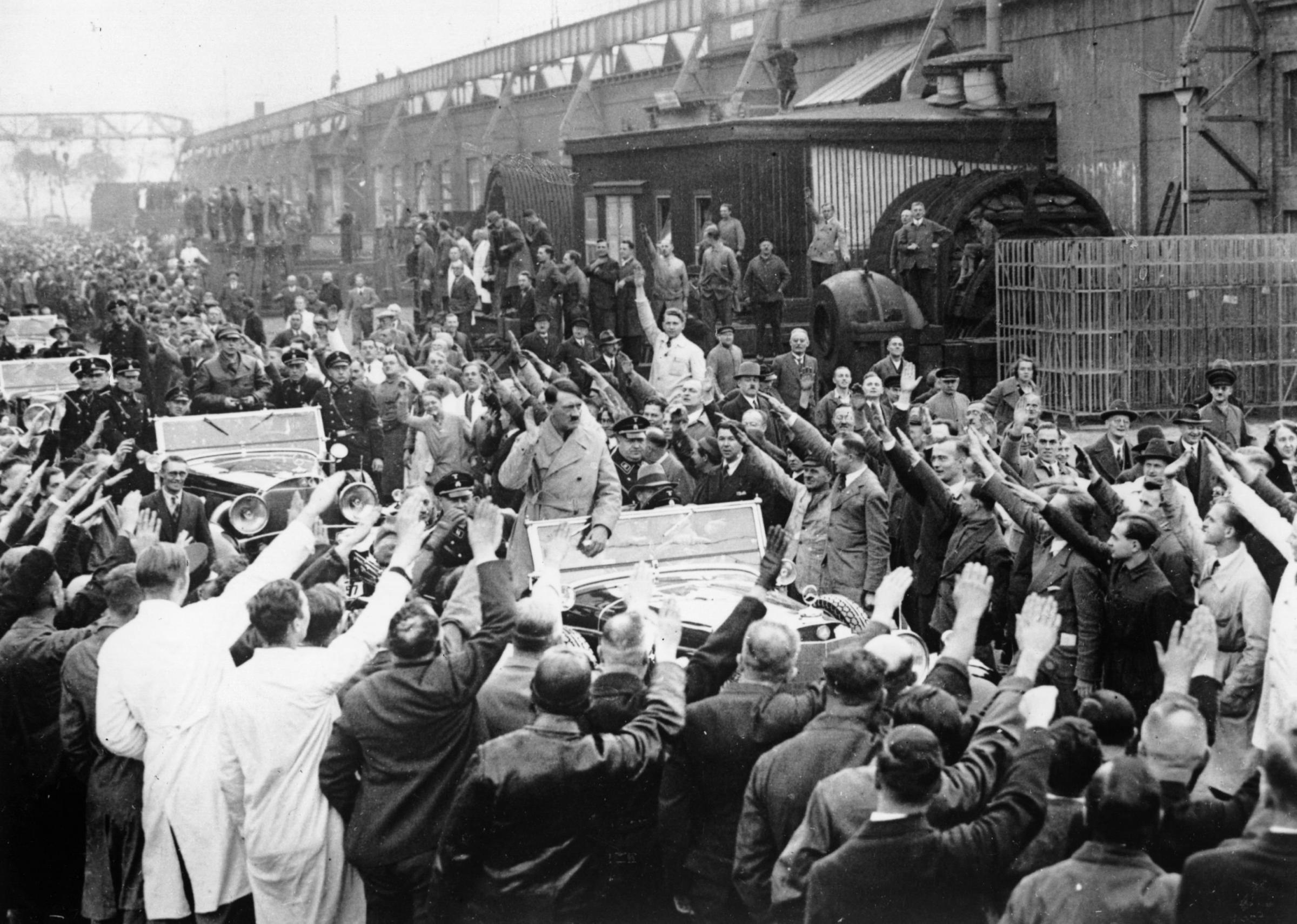 11th November 1933: German dictator Adolf Hitler (1889 - 1945) leaving the Siemens works, after making his final speech prior to the German election. (Photo by Keystone/Getty Images).