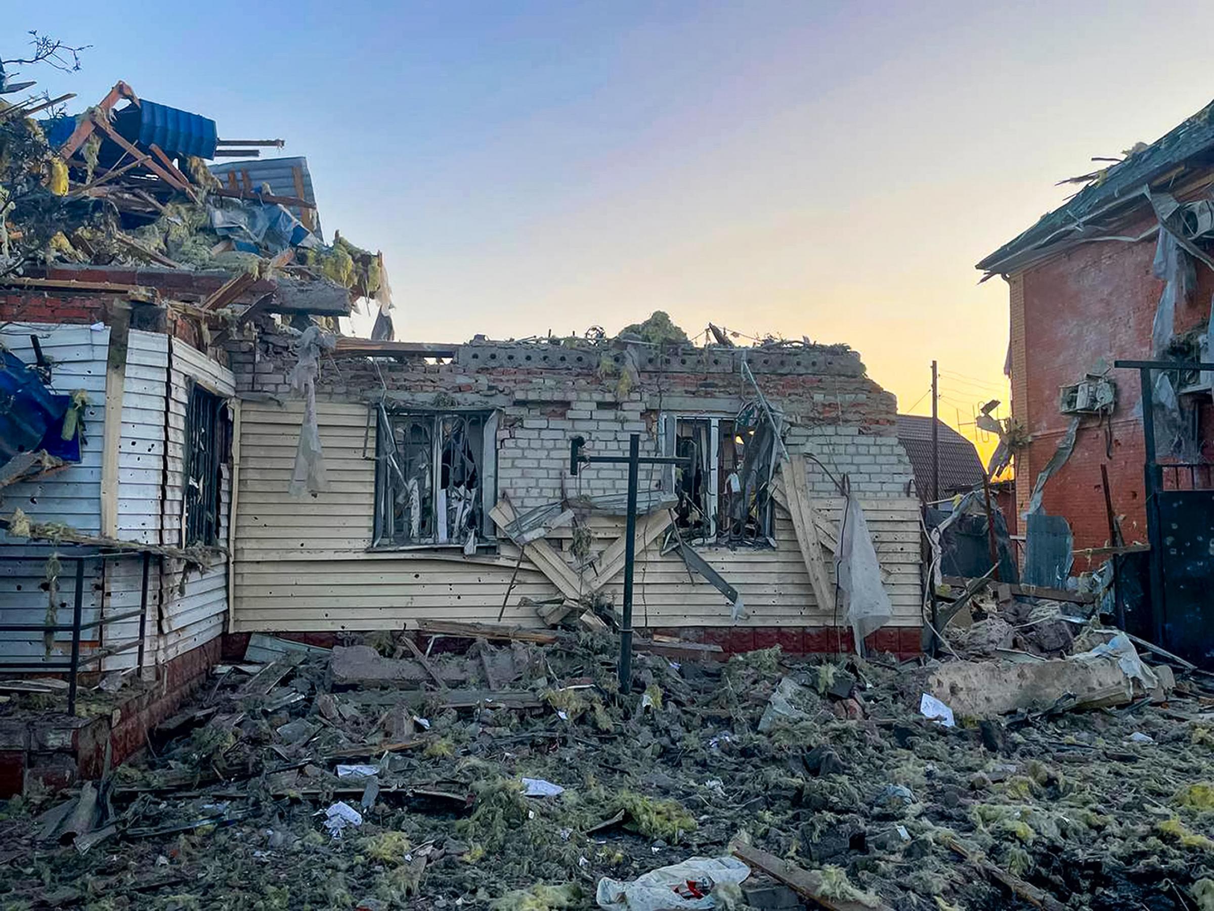 This photo released by the acting Governor of Kursk region Alexei Smirnov telegram channel, shows a damaged house after shelling by the Ukrainian side in the city of Sudzha, Kursk region that borders Ukraine, Tuesday, Aug. 6, 2024. Russian officials said