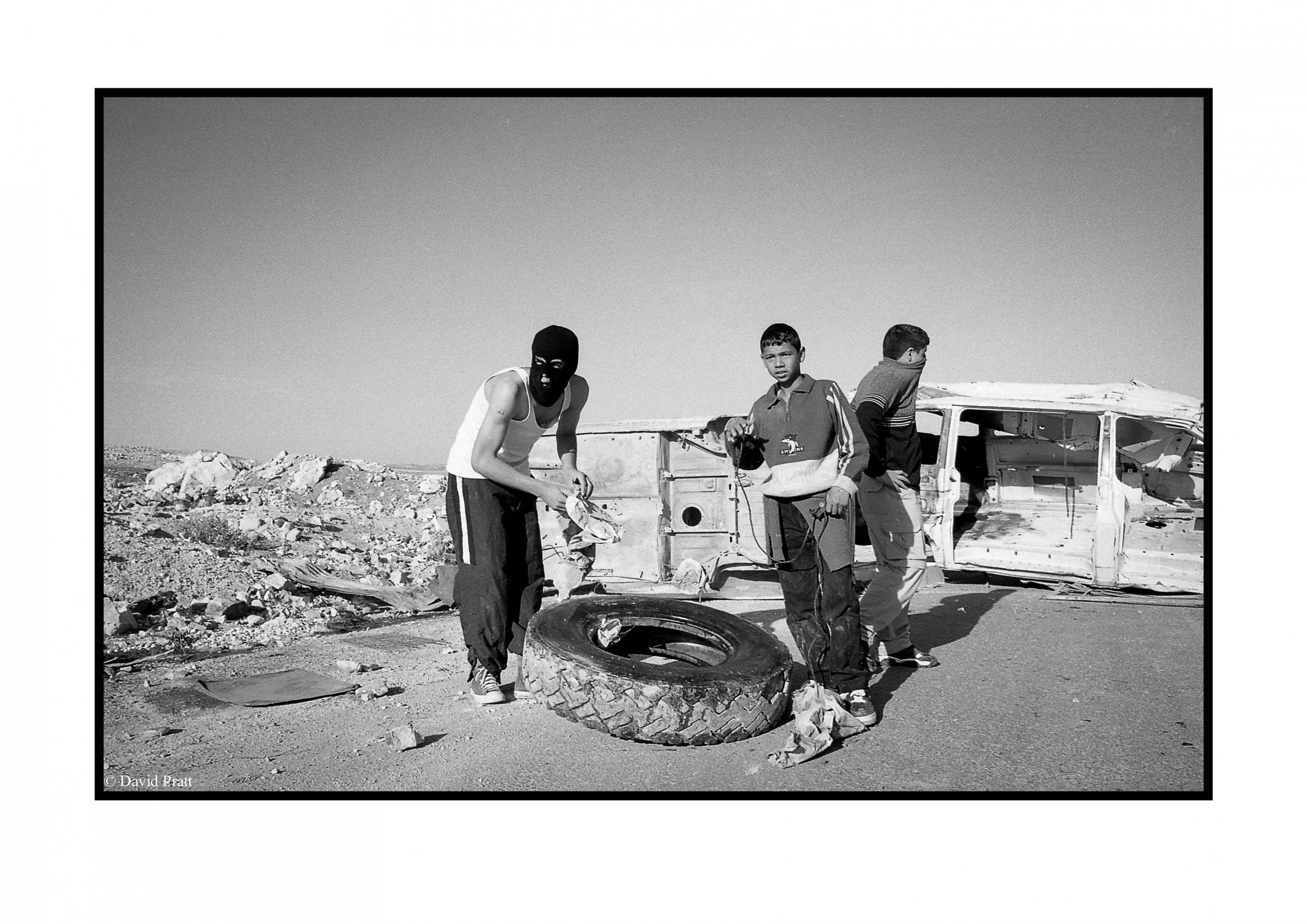 Palestinians erect barricades during intifada - West Bank 1988. Intifada - war of the stones All Pics Â© David Pratt.