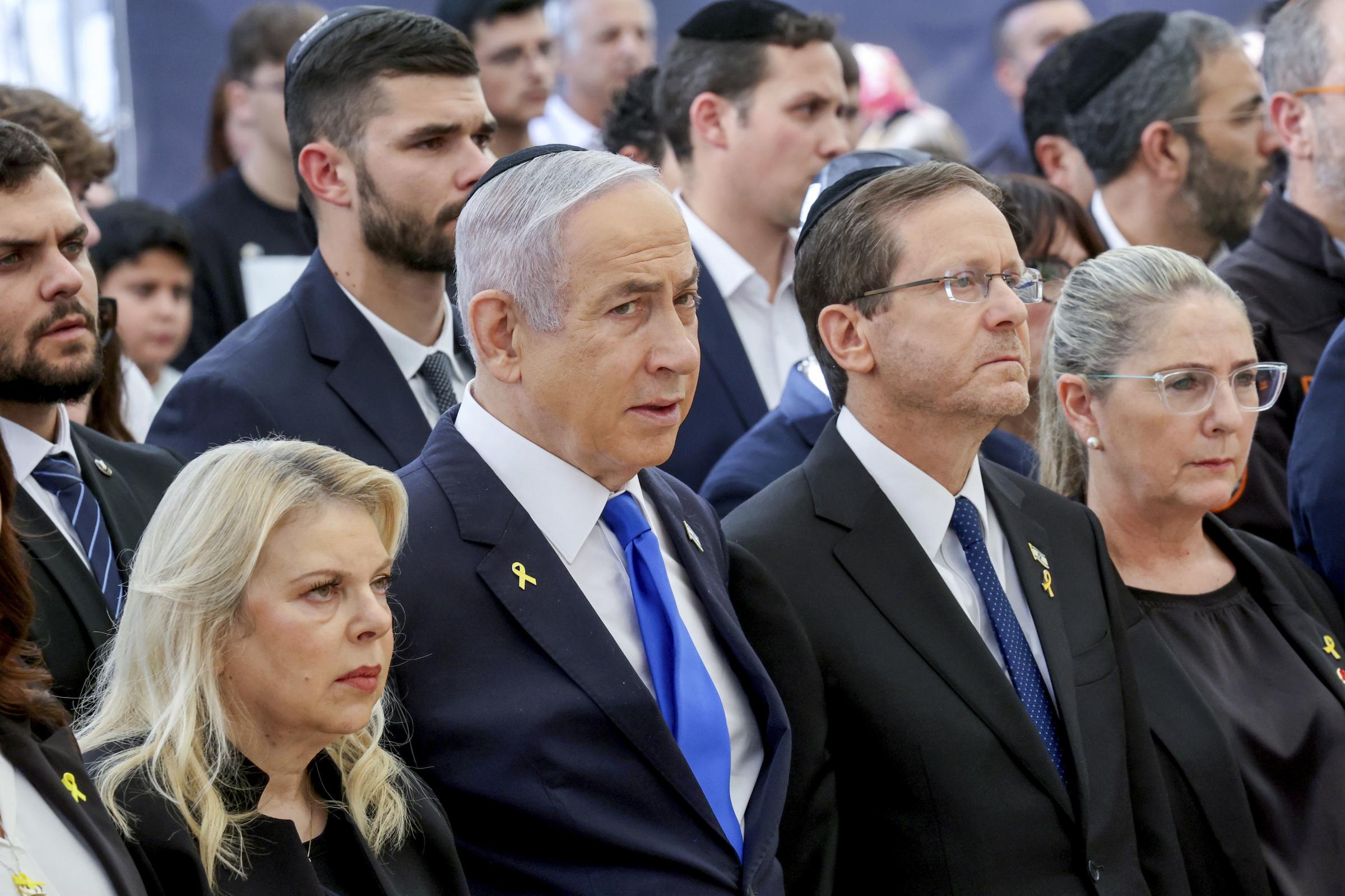 Israeli Prime Ministers wife Sara Netanyahu, from left, Prime Minister Benjamin Netanyahu, President Isaac Herzog and First Lady Michal Herzog attend a ceremony marking the Hebrew calendar anniversary of the Hamas attack on October 7 last year, at the