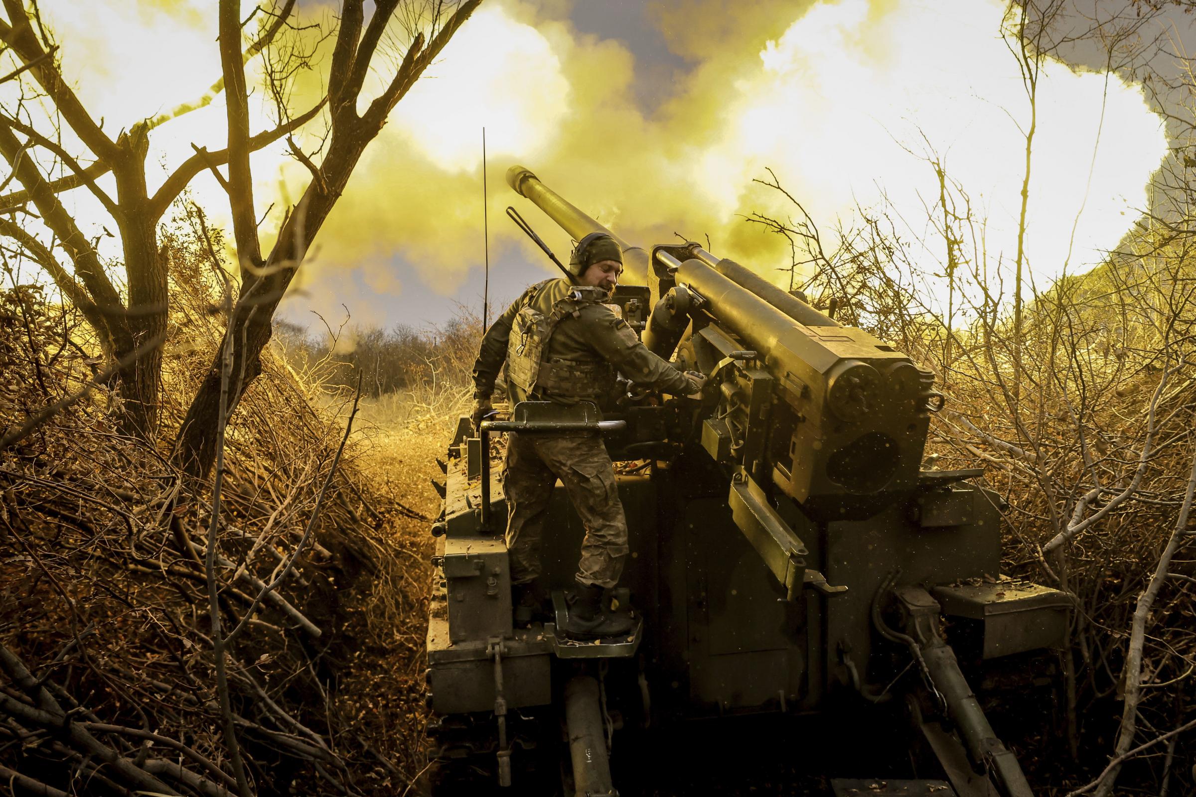 In this photo provided by Ukraines 24th Mechanised Brigade press service, servicemen of the 24th Mechanised Brigade fire 2s5 self-propelled 152mm howitzer towards Russian positions near Chasiv Yar, Donetsk region, Ukraine, Monday, Nov. 18, 2024. (Oleg