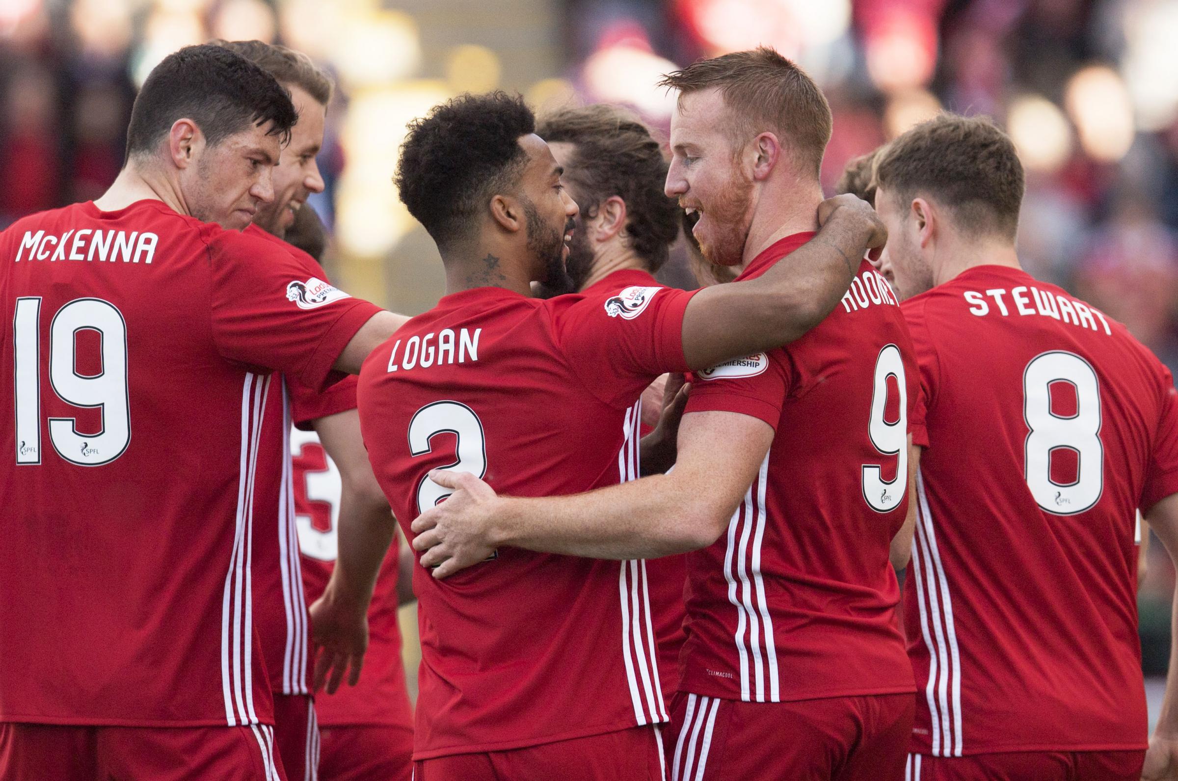 Aberdeen hit top form as they draw level with Celtic after Rooney hat-trick sinks St Johnstone