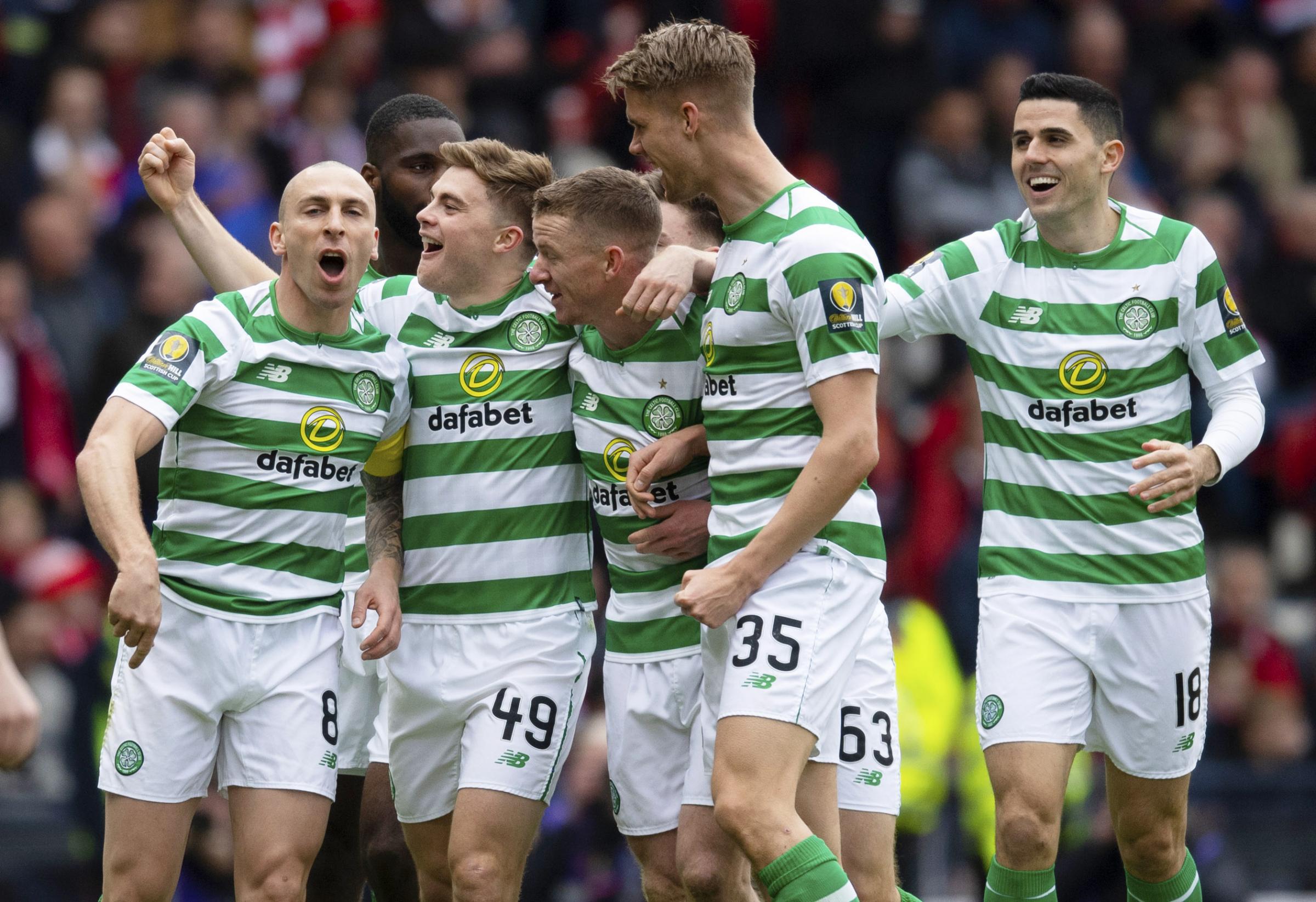 Aberdeen 0 Celtic 3: Business as usual for Celtic as they crush nine-man Dons