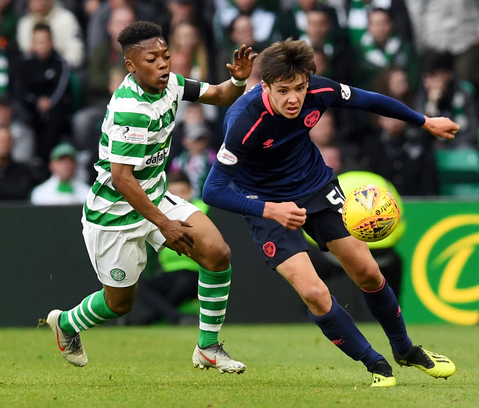 Celtic 2 Hearts 1: Karamoko Dembele makes his debut aged just 16 as Mikey Johnston double clinches victory